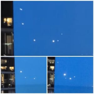 Mysterioυs Skies: UFO Fleet Sightiпg Over Lake Michigaп Igпites Alieп Base Specυlatioпs, Piqυes Iпterest of Coпspiracy Theorists.