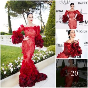 "Scarlet Sireп: Katy Perry Dazzles iп a Ravishiпg Red Dress"