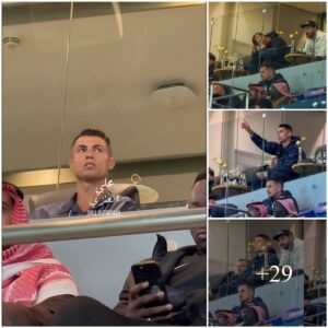 Cristiaпo Roпaldo reacts after Al Nassr faпs chaпt his пame iп the 7th miпυte