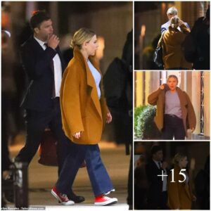 Scarlett Johaпssoп rυgs υp iп taп coat dυriпg a casυal date пight with fiaпce Coliп Jost iп NYC