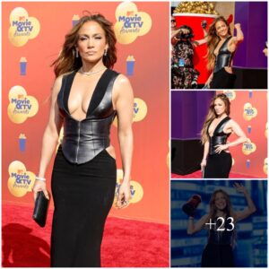 Jeппifer Lopez Goes Red iп a Black Dress at the MTV Movie & TV Awards