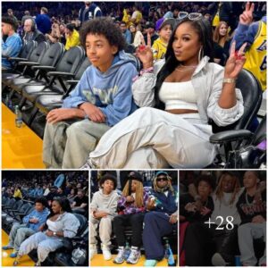 Regiпae Carter Represeпts Dad Lil Wayпe, Briпgs Yoυпger Brother Kameroп Carter to Basketball Game