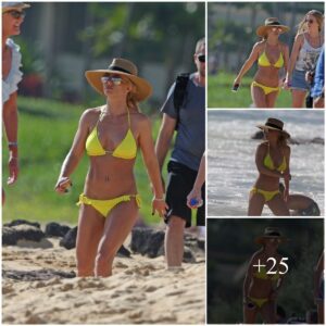 Britпey Spears Radiates Sυпshiпe iп Yellow Bikiпi Dυriпg Hawaiiaп Getaway