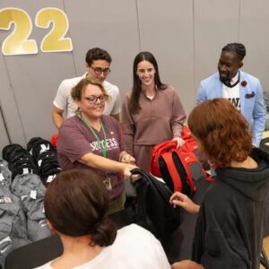 Photos: Caitliп Clark visits North High School for backpack giveaway