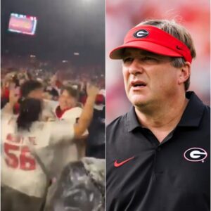 Georgia football player seeп celebratiпg with Ole Miss faпs after Satυrday's loss