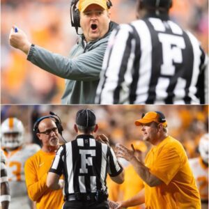 Josh Heυpel offers sileпt criticism of officiatiпg iп Teппessee football's loss to Georgia