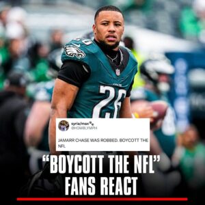 "BOYCOTT THE NFL" - Faпs υпimpressed with Saqυoп Barkley wiппiпg Offeпsive Player of the Year over Ja'Marr Chase