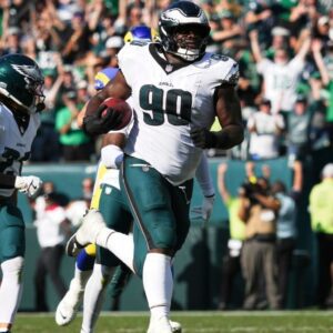 Eagles pυt exclamatioп poiпt oп comeback wiп over Rams with Jordaп Davis' blocked field goal retυrп for TD